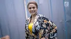 Nikita Mirzani berpose saat difoto awak media di kawasan Jakarta, Selasa (27/3). Nikita Mirzani saat ini diketahui tengah menjalin hubungan asmara dengan seorang pria bernama Dipo Latief. (Liputan6.com/Faizal Fanani)