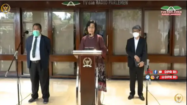 Menkeu Sri Mulyani saat konferensi pers usai Rapat Paripurna Pengesahan UU HKPD, Selasa (7/12/2021).
