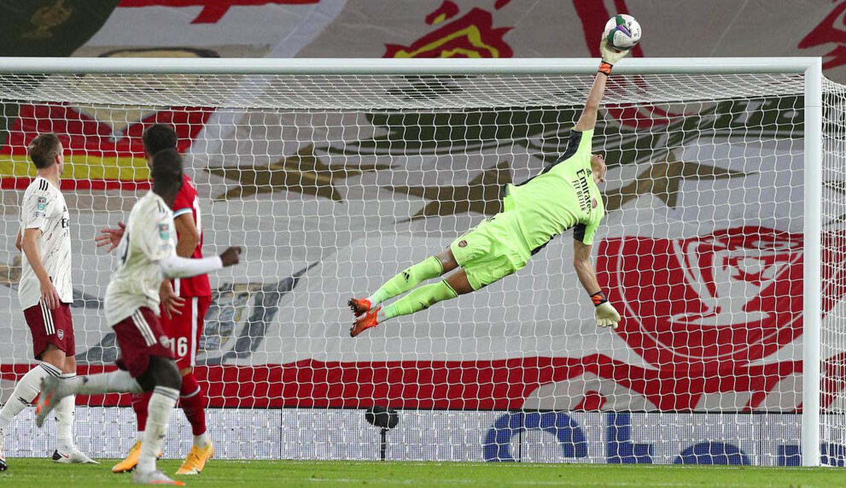 Penjaga gawang The Gunners itu tampil gemilang dan sukses melakukan beberapa penyelamatan termasuk saat adu penalti. (Peter Byrne/Pool via AP)