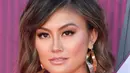 Penyanyi Agnez Mo berpose saat menghadiri iHeartRadio Music Awards 2019 di Los Angeles, California, AS, Kamis (14/3). Agnez Mo meraih iHeartRadio Music Awards 2019 setelah menang vote di media sosial. (Frazer Harrison/Getty Images North America/AFP)