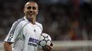 3. Fabio Cannavaro - Kasus Calciopoli membuatnya meninggalkan Juventus untuk bergabung dengan Real Madrid. Namun selang tiga tahun kemudian kembali ke Turin dengan status bebas transfer. (Photo by BRU GARCIA / AFP)