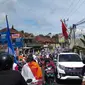 Kampanye pendukung capres-cawapres Prabowo-Sandiaga Uno buat macet jalur Puncak, Bogor. (Liputan6.com/Achmad Sudarno)