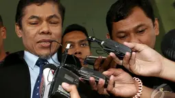 Muhammad Yusuf menjawab pertanyaan wartawan seusai mengadakan pertemuan dengan KPK digedung Komisi Pemberantasan Korupsi, Jakarta, Kamis (23/10/2014) (Liputan6.com/Miftahul Hayat) 