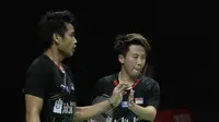 Pasangan Indonesia, Tontowi Ahmad/Lilyana Natsir, saat melawan wakil Cina, Zheng Siwei/Huang Yaqiong, pada laga Indonesia Masters 2019 di Istora, Jakarta, Minggu (27/1). Tontowi/Liliyana kalah 21-19, 19-21, 16-21. (Bola.com/M Iqbal Ichsan)