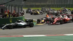 Suasana balapan F1 GP Belgia di di Sirkuit Spa-Francorchamps, Minggu (28/8/2016). Lewis Hamilton mengawali balapan dari posisi ke-21 dan menyelesaikan balapan di podium ketiga. (AFP/John Thys)