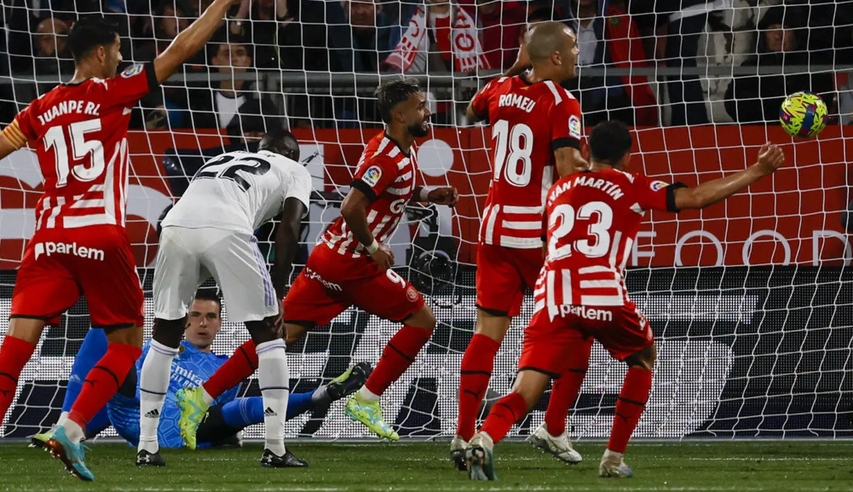 <p>Empat gol kemenangan Girona diborong Valentin Castellanos. Sementara gol-gol Real Madrid dibuat Vinicius Junior dan Lucas Vazquez. (AP Photo/Joan Monfort)</p>