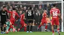 The Reds membuka keunggulan pada menit ke-11 lewat aksi Alexis Mac Allister. (Paul ELLIS/AFP)
