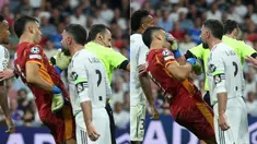 Bek veteran Real Madrid Dani Carvajal terekam kamera menanduk kiper Marseille Gerónimo Rulli pada menit ke-72. (AFP/Thomas Coex)