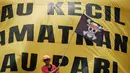 Seorang warga Pulau Pari, Jakarta Utara, berpakaian layaknya tokoh utama anime Jepang One Piece, saat aksi unjuk rasa di depan kantor Kementerian Kelautan dan Perikanan di Jakarta pada Rabu 8 Oktober 2025. (Yasuyoshi CHIBA/AFP)