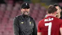 Manajer Liverpool, Jurgen Klopp bereaksi saat bersua Napoli, pada Matchday 2 Liga Champions 2018-20019, Kamis (4/10/2018).  (AFP / Alberto Pizzoli)