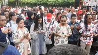 Gibran Rakabuming Raka dikawal para relawan pendukungnya mendaftar sebagai calon wali kota Solo ke DPD PDIP Jawa Tengah, Kamis (12/12/2019). (Liputan6.com/ Fajar Abrori)