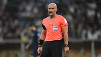 Wasit Szymon Marciniak saat memimpin laga final Piala Dunia 2022 antara Argentina melawan Prancis di Lusail Stadium, Doha pada 18 Desember 2022. Baru-baru ini, UEFA menunjuk Marciniak sebagai wasit utama untuk final Liga Champions 2022/2023 antara Manchcester City melawan Inter Milan di Ataturk Olympic Stadium, Istanbul Turki. (AFP/Paul Ellis)