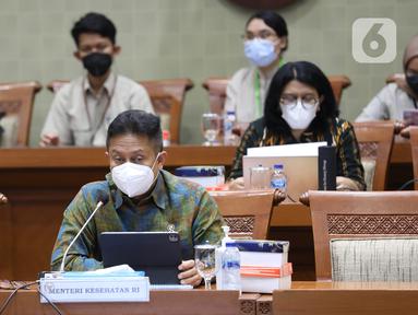 Menteri Kesehatan Budi Gunadi Sadikin mengikuti rapat kerja dengan Komisi IX DPR di Kompleks Parlemen, Senayan, Jakarta, Senin (4/7/2022). Raker membahas perubahan Tarif Indonesian - Case Based Groups (INA-CBGs) dan kapitasi dalam rangka implementasi kebutuhan dasar kesehatan. (Liputa6.com/Angga Yuniar)