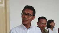 Pemerintah Provinisi Sumatera Barat meminta Air Asia menghentikan sementara penerbangan rute Kuala Lumpur - Padang untuk mengantisipasi penularan virus corona Covid-19. (Liputan6.com/ Novia Harlina)