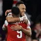 Striker Arsenal, Pierre-Emerick Aubameyang berselebrasi dengan rekannya, Alexandre Lacazette setelah mencetak gol ke gawang Valencia dalam leg pertama semifinal Liga Europa di Emirates Stadium, Jumat (3/5/2019). Sempat tertinggal, Arsenal berhasil mengalahkan Valencia 3-1. (AP/Kirsty Wigglesworth)