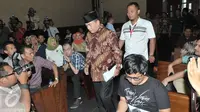 Mantan Ketua DPR Ade Komarudin atau Akom bersiap untuk memberi kesaksian di sidang lanjutan sidang perkara korupsi e-KTP, di Gedung Tipikor, Jakarta, Kamis (6/4). Pada dakwaan kasus e-KTP terdapat nama Ade Komarudin. (Liputan6.com/Helmi Afandi)