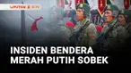 Bendera Merah Putih berukuran raksasa sobek saat dikibarkan di Monumen Nasional dalam gladi bersih HUT ke-80 TNI.