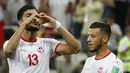 Gelandang Tunisia, Ferjani Sassi, merayakan gol ke gawang Inggris pada laga Grup G Piala Dunia di Volgograd Arena, Volgograd, Senin (18/6/2018). Inggris menang 2-1 atas Tunisia. (AP/Alastair Grant)