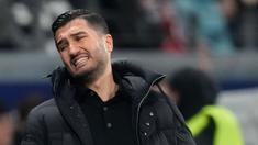 Borussia Dortmund kembali telan kekalahan untuk ketiga kalinya secara beruntun di Bundesliga. Kali ini, tim asuhan Nuri Sahin takluk dari tuan rumah Eintracht Frankfurt dengan skor 2-0, Sabtu (18/1/2025) dini hari WIB. (AP Photo/Michael Probst)