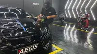 Proses perawatan bodi kendaraan oleh Aegis Auto Detailing. (ist)