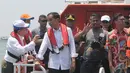 Dengan pengawalan ketat Pasukan Pengamanan Presiden (Paspampres), Jokowi duduk di dek kapal bagian belakang, Jakarta, Selasa (23/9/2014) (Liputan6.com/Herman zakharia)