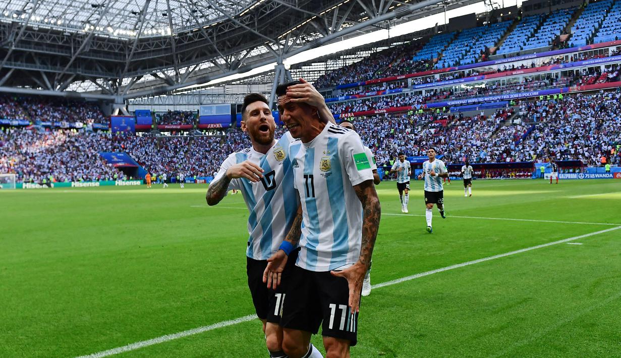 Di Maria juga jadi andalan di timas Argentina meski ia harus mengalami penyesuaian posisi lantaran kehadiran Messi. (Foto: AFP/Luis Acosta)