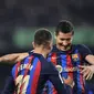 Robert Lewandowski merayakan gol pertama Barcelona saat melawan Cadiz pada lanjutan Liga Spanyol di Camp Nou (AFP)
