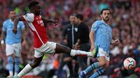 Arsenal menang 1-0 atas Manchester City pada laga pekan kedelapan Premier League di Stadion Emirates, Minggu (8/10/2023) malam WIB. Gol tunggal The Gunners disarangkan Gabriel Martinelli. (AFP/Adrian Dennis)