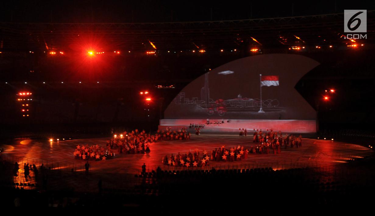 Penari membawakan tarian bertema Keberagaman di Indonesia saat pembukaan Asian Para Games 2018 di Stadion Utama Gelora Bung Karno, Jakarta, Sabtu (6/10). Asian Para Games 2018 berlangsung 6-13 Oktober. (Liputan6.com/Helmi Fithriansyah)