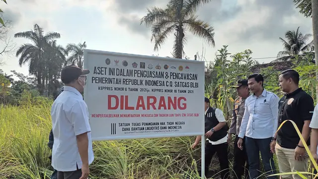 Satgas BLBI melakukan kegiatan penguasaan fisik berupa pemasangan plang atas Aset Properti eks BPPN/eks BLBI berupa tanah di Kota Bandar Lampung