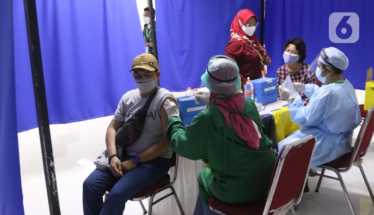 (24/7/2021). Pemerintah sebelumnya menetapkan target sasaran vaksinasi 181,5 juta atau 70 persen dari total populasi untuk mencapai kekebalan kelompok atau herd immunity. (Liputan6.com/Angga Yuniar)