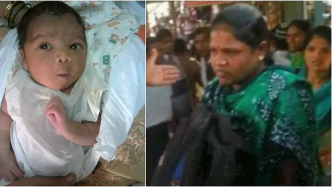 Bayi dan petugas rumah penampungan| Photo copyright Dailymail.co.uk