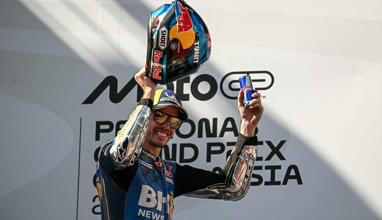 09,24 menit pada balapan yang digelar di Sirkuit Internasional Sepang, Malaysia, Minggu (26/10/2025). (Lillian SUWANRUMPHA/AFP)