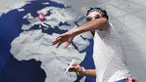 Seorang peserta menerbangkan pesawat kertas pada ajang kompetisi Red Bull Paper Wings World Final 2019 di Salzburg, Austria pada 17 Mei 2019. Lebih dari 170 peserta dari seluruh dunia berpartisipasi dalam tiga kategori yaitu jarak terpanjang, waktu terpanjang, dan aerobatik. (ALEX HALADA / AFP)