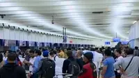 Antrean panjang terjadi di bagian check in Terminal 1C Soekarno Hatta.