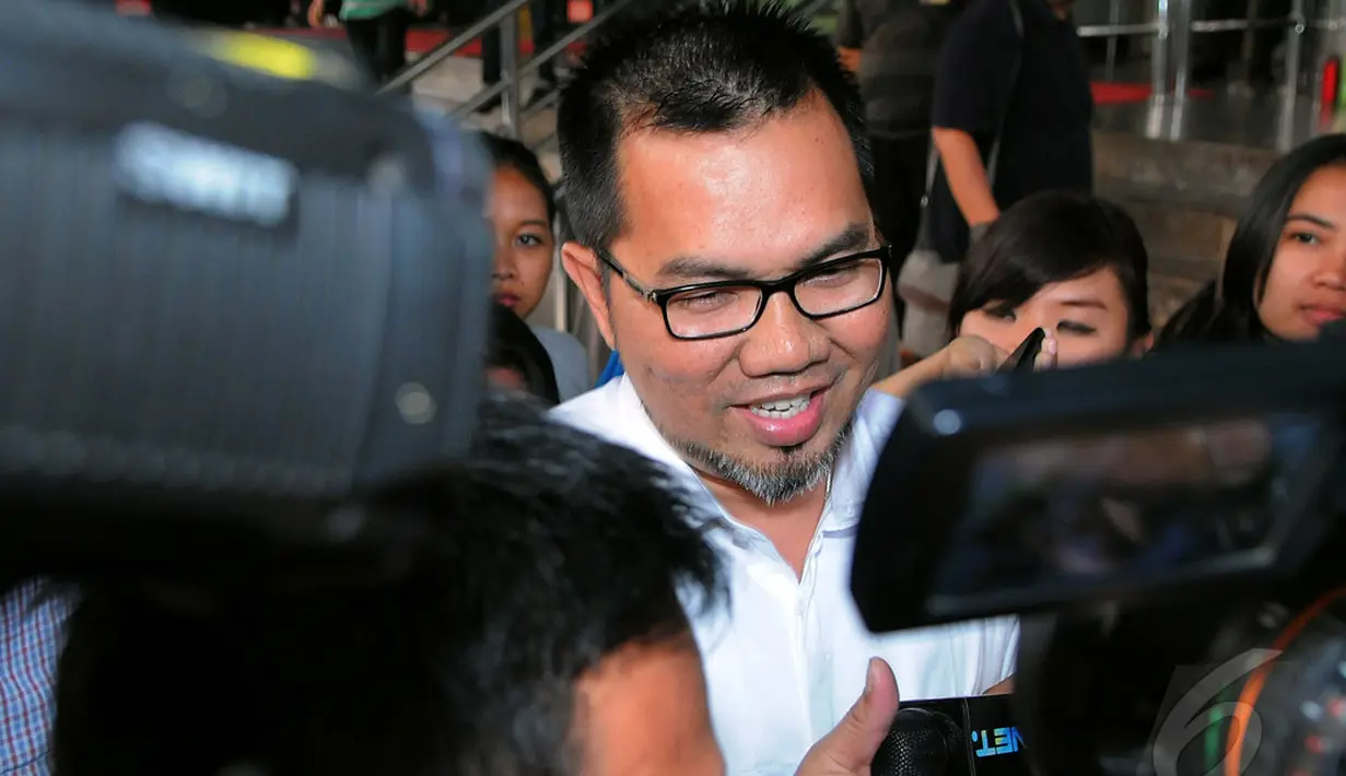 Budi tidak memberikan komentar saat ditanya, wartawan KPK akan menetapkan dirinya sebagai tersangka. Ia hanya berkata jangan berandai-andai, Senin (1/9/2014) (Liputan6.com/Faisal R Syam)