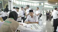 Badan Amil Zakat Nasional (BAZNAS) Kota Tangerang mencatatkan capaian pendapatan zakat fitrah selama Ramadan 1445 Hijriah. BAZNAS mengumpulkan sekitar Rp8,7 miliar yang langsung disalurkan (Istimewa)