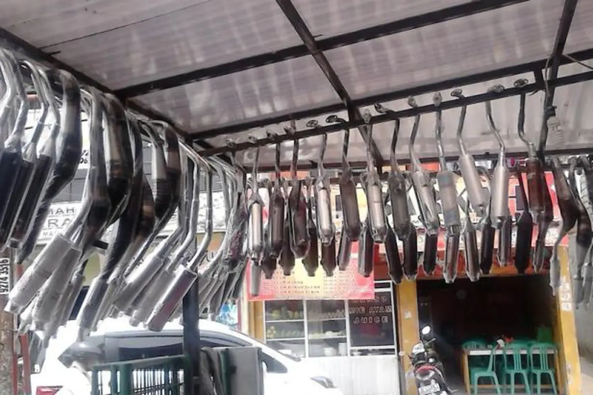Ketahui Penyebab Knalpot Motor Bolong