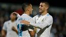 Pemain Real Madrid, Theo Hernandez, merayakan gol yang dicetak Lucas Vazquez ke gawang Fuenlabrada pada laga Copa del Rey di Stadion Fernando Torres, Madrid, Kamis (26/10/2017). Fuenlabrada kalah 0-2 dari Madrid. (AP/Francisco Seco)