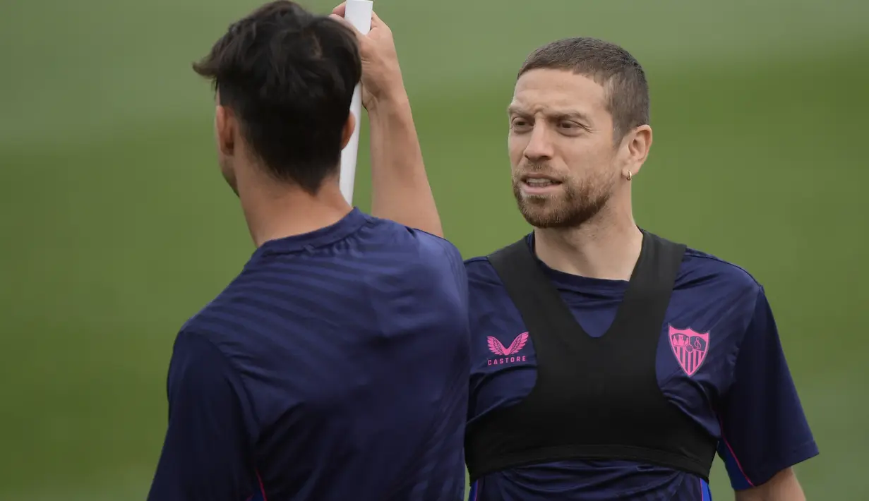 Pada leg pertama di Italia, Kedua tim bermain imbang 1-1. (AFP/Cristina Quicler)