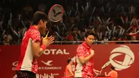 Pebulutangkis ganda campuran Indonesia, Tontowi Ahmad/Liliyana Natsir, saat bertanding melawan pebulutangkis Rusia, Rodion Kargaev/Ekaterina Bolotova dalam Kejuaraan Dunia Bulutangkis 2015 di Istora Gelora Bung Karno, Senayan, Jakarta. Selasa (11/8/2015).