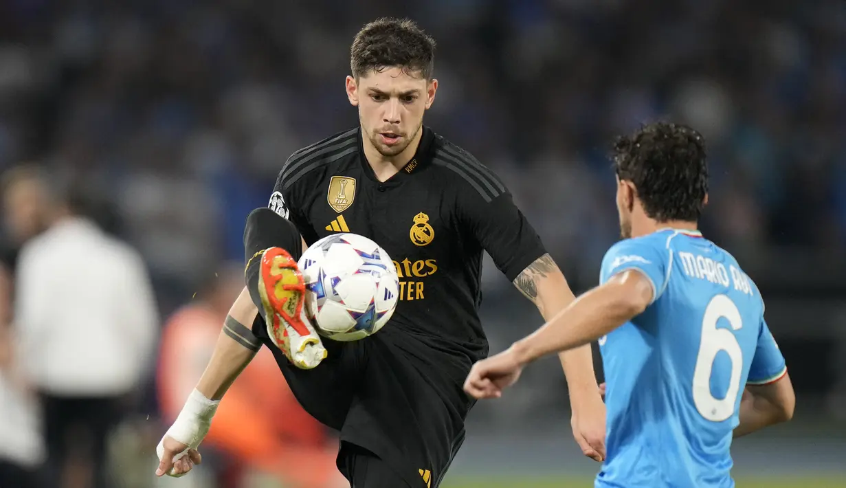 Gol Real Madrid dicetak oleh Vinicius (27'), Bellingham (34') dan gol bunuh diri dari Alex Meret (78').  (AP Photo/Alessandra Tarantino)