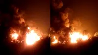 Kebakaran penampungan Bahan Bakar Minyak (BBM) ilegal terjadi di Kabupaten Ogan Ilir, Sumsel, Senin malam (26/9/2022). (Liputan6.com/ Ist)