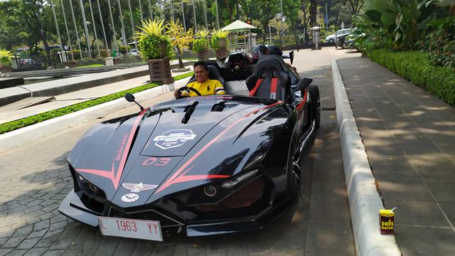 Mobil listrik Lowo Ireng produksi dari Institut Teknologi Sepuluh Nopember (ITS).(Liputan6.com/ Ika Defianti)