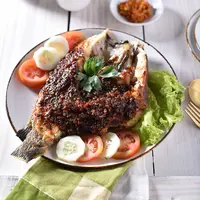 ilustrasi ikan bakar/Musfirahsergi99 /Shutterstock