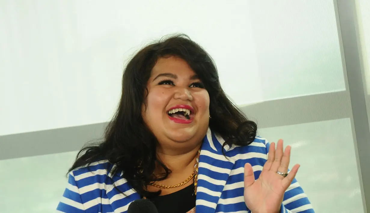 Berbeda dengan Runner Up Miss Big Indonesia 2014, Deliza Magdalia Faruwu, yang mengaku memiliki badan yang besar sejak kecil. "Keluarga saya memang gede-gede," kata Deliza, (16/7/2014). (Liputan6.com/Helmi Fithriansyah)