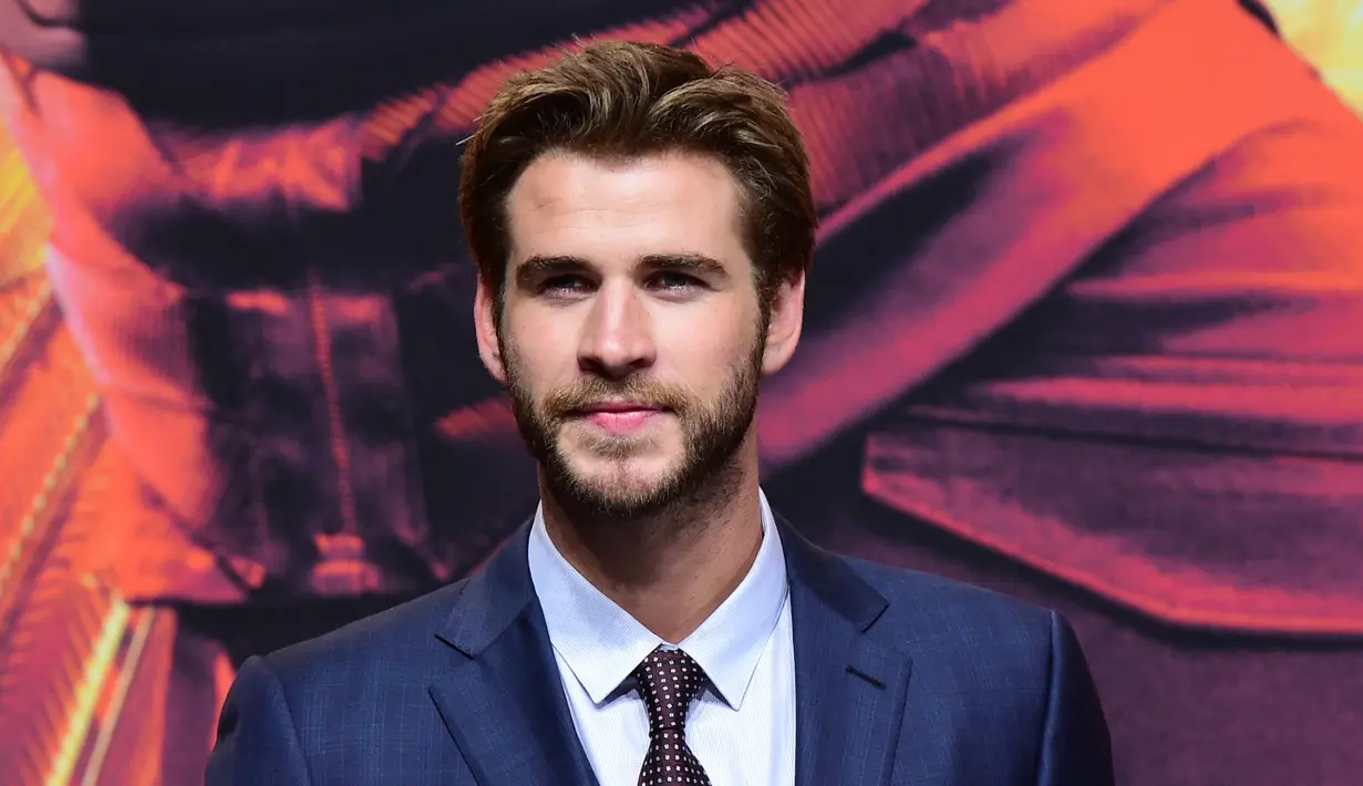 Dalam sebuah wawancara dengan Men’s Fitness edisi terbaru, saudara Chris Hemsworth ini mengatakan kalau dia tidak menyesal pernah bertunangan dengan Miley Cyrus. (AFP/Bintang.com)