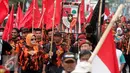 Massa dari Pemuda Pancila ikut dalam aksi peringatan pemberontakan G 30 S-PKI di Malioboro,Yogyakarta, Jumat (30/9). Aksi ini dilakukan untuk menangkal paham komunisme di Indonesia. (Liputan6.com/ Boy Harjanto)