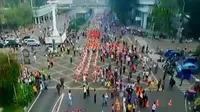 Ribuan peserta mengikuti long march bersama di jantung Ibu Kota Jakarta. 