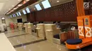 Kondisi ruang check in di Bandara Internasional Yogyakarta, Kulon Progo, DI Yogyakarta, Selasa (23/4).Progres pembangunan Bandara Internasional Yogyakarta hampir 100 persen, sementara progres pembangunan keseluruhannya termasuk domestik mencapai 47 persen. (Liputan6.com/Helmi Fithriansyah)